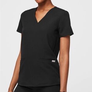 2 Figs scrub sets. (2)pants, (2)tops